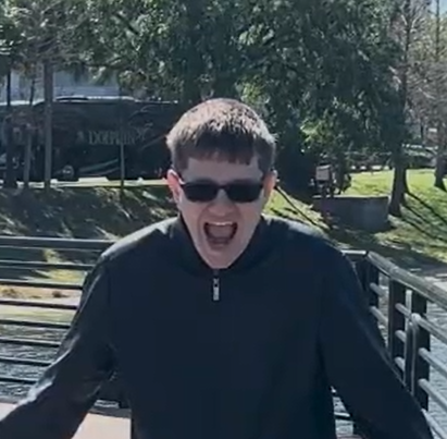 Screenshot of me screaming from a film I produced for Digital Video Fundamentals (Spring 2025)